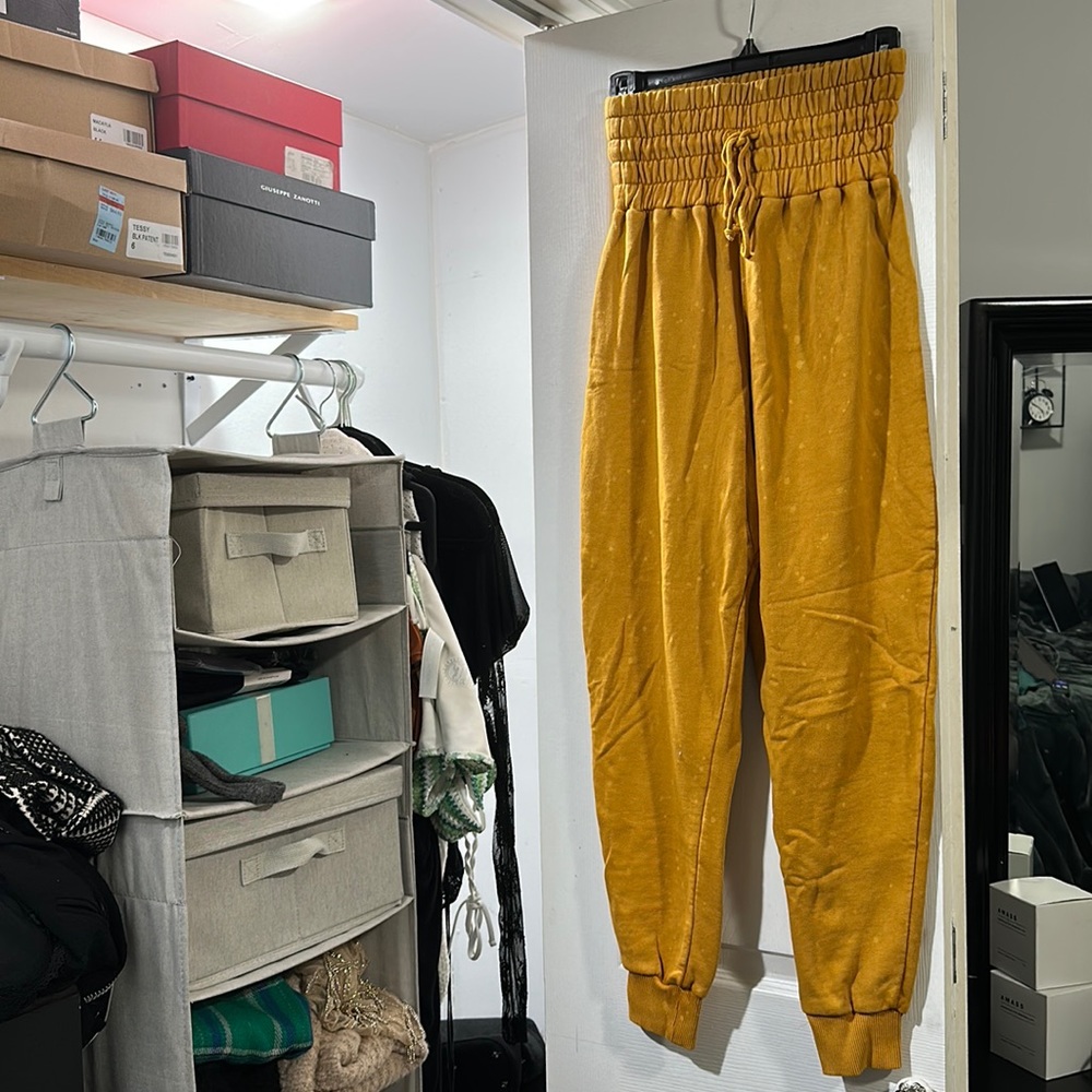 Mustard Urban Outfitters Puffy Pants with light bleach spots. - Picture 1 of 9